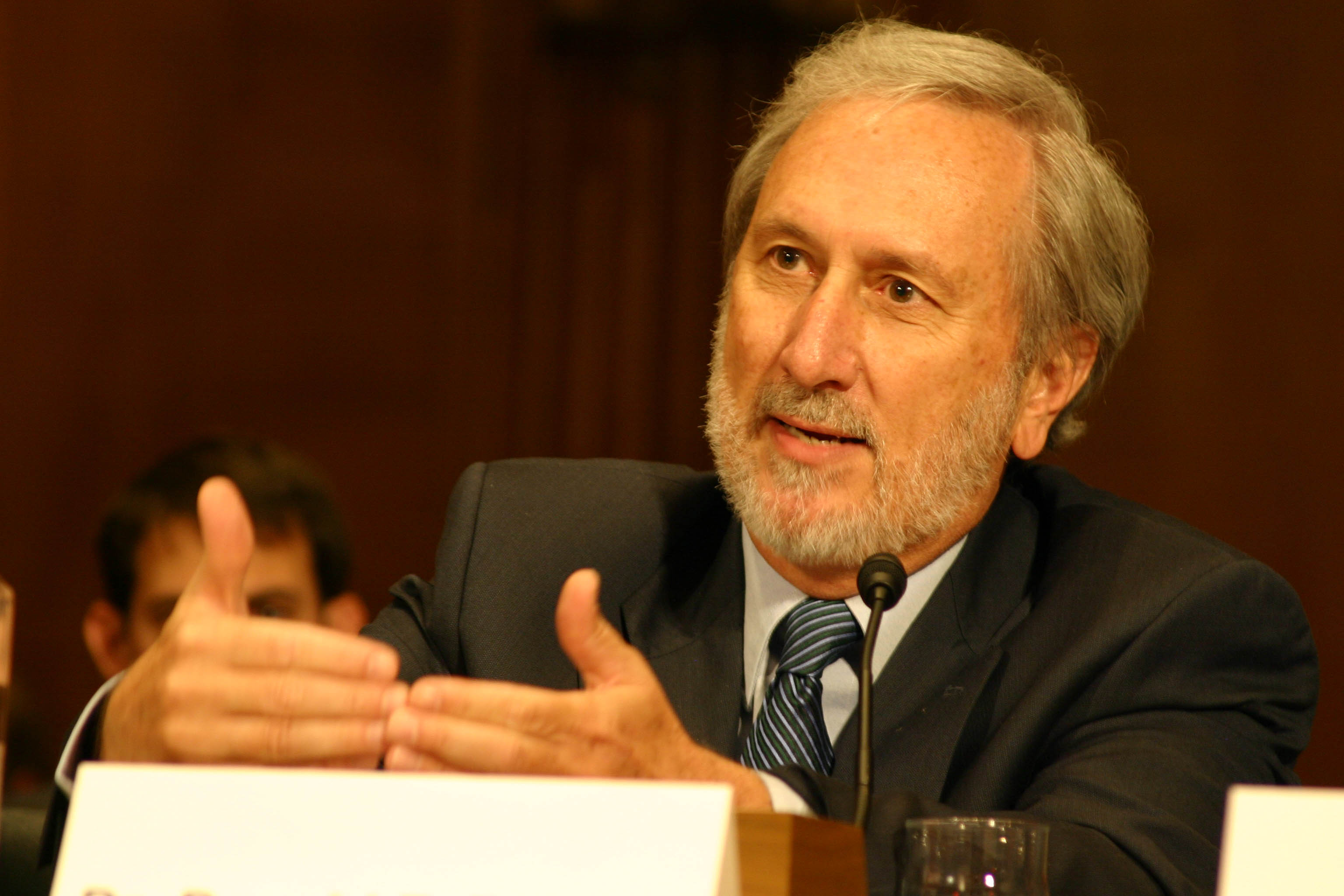 Boesch testifying at a hearing