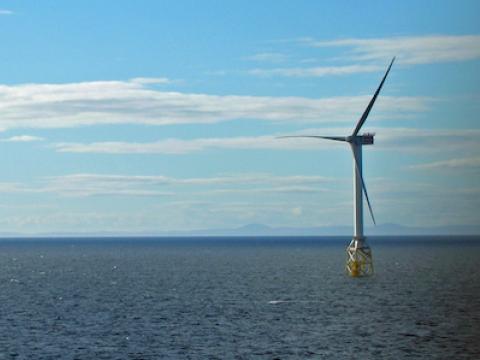 An ocean-based turbine spins on a sunny day. Photo courtesy of the University of Aberdeen.
