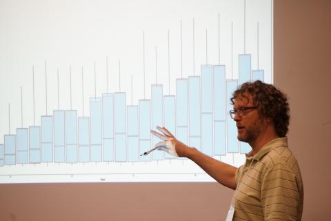 Michael Wilberg discusses a graph at an OysterFutures meeting. 