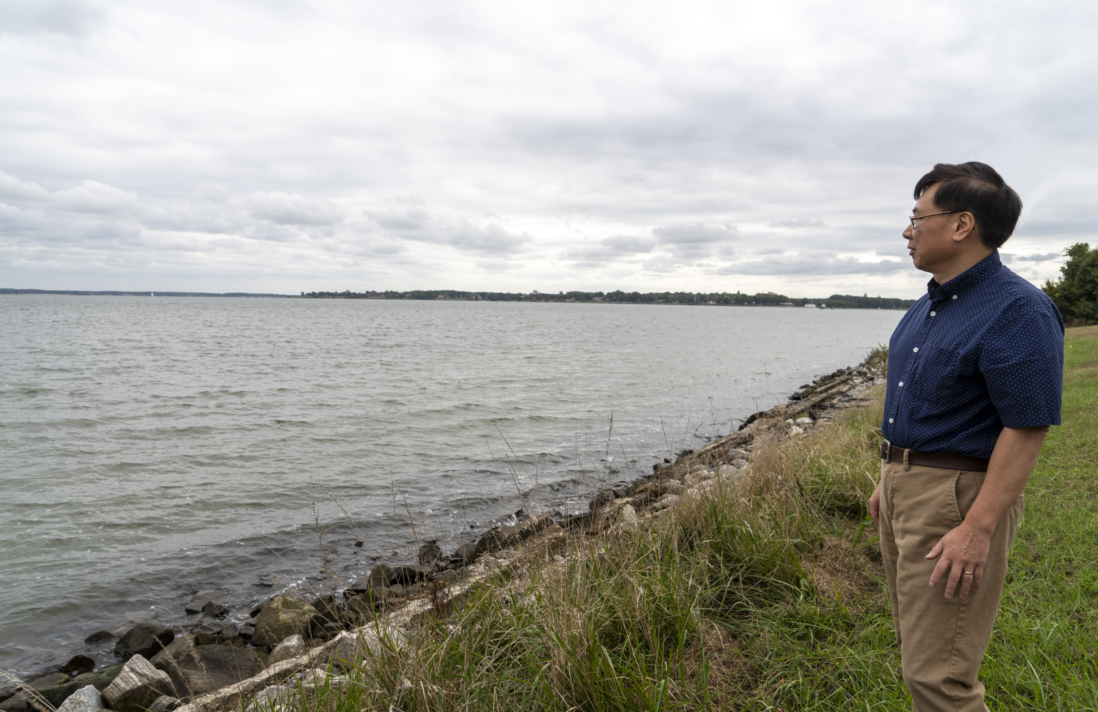 Ming Li outside the Horn Point Laboratory looking out at the Chesapeake Bay